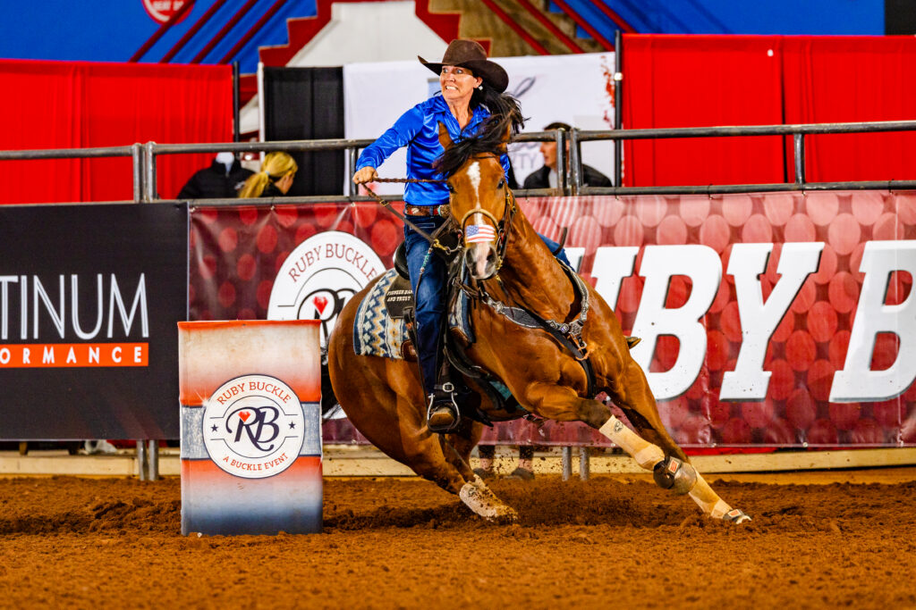 Heidi Gunderson turns a barrel on her horse Casey