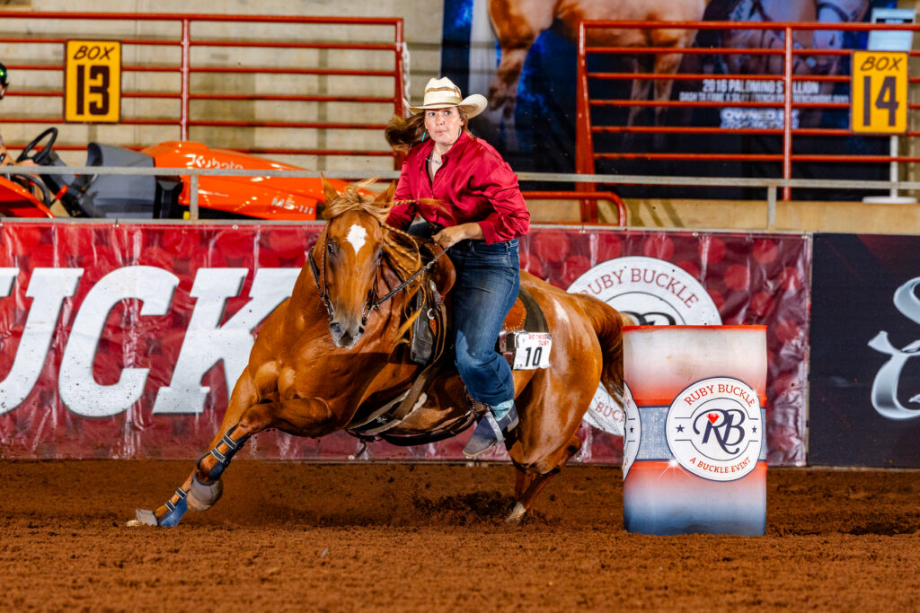 Rebecca Sleeman turns a barrel on her horse