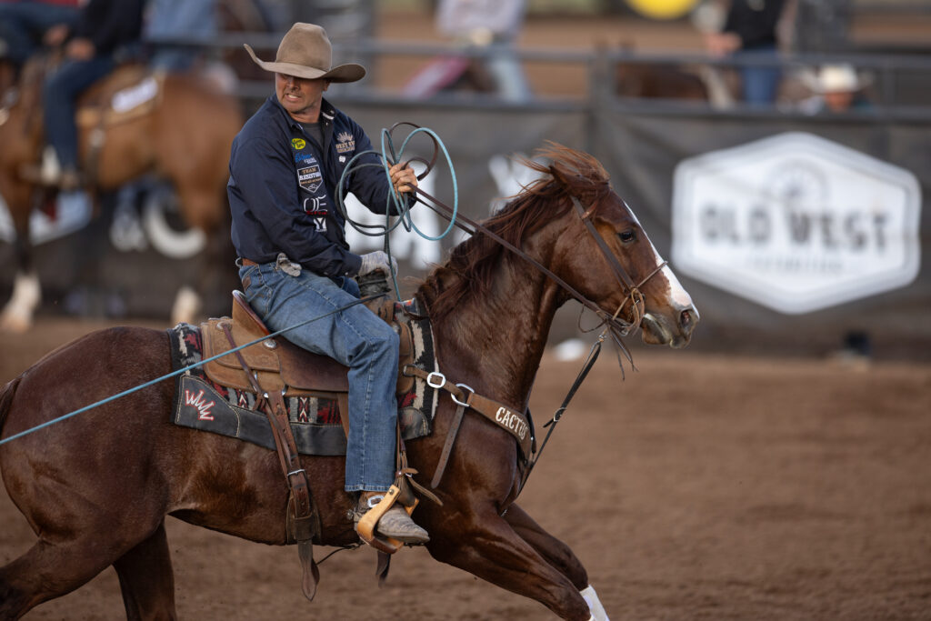 Andy Holcomb and Shes A Bossy Rebel winning the Old West's Pre-Futurity Heading June 21 in Heber City, Utah. | TRJ File Photo