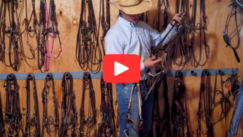 Caleb Smidt stands in front of his collection of bits.
