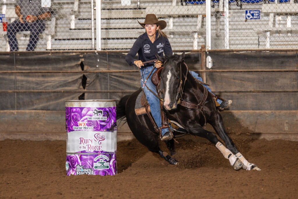 Gamblinslick and Ceri Ward barrel racing