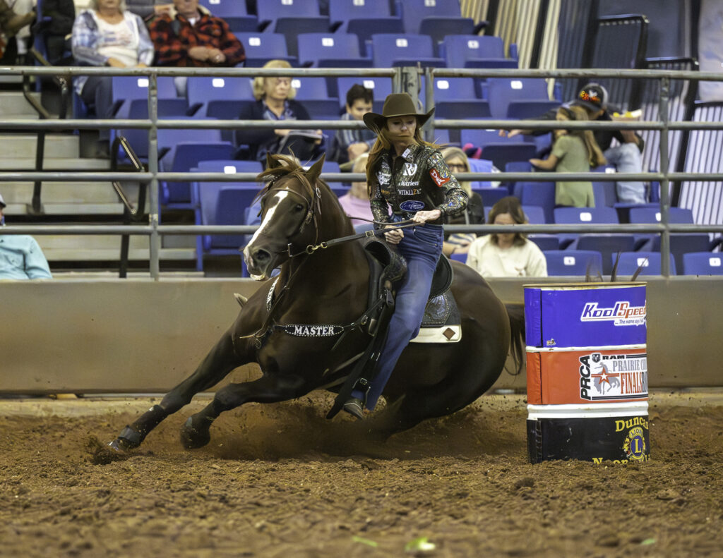 Emily Beisel and Pipewrench barrel racing