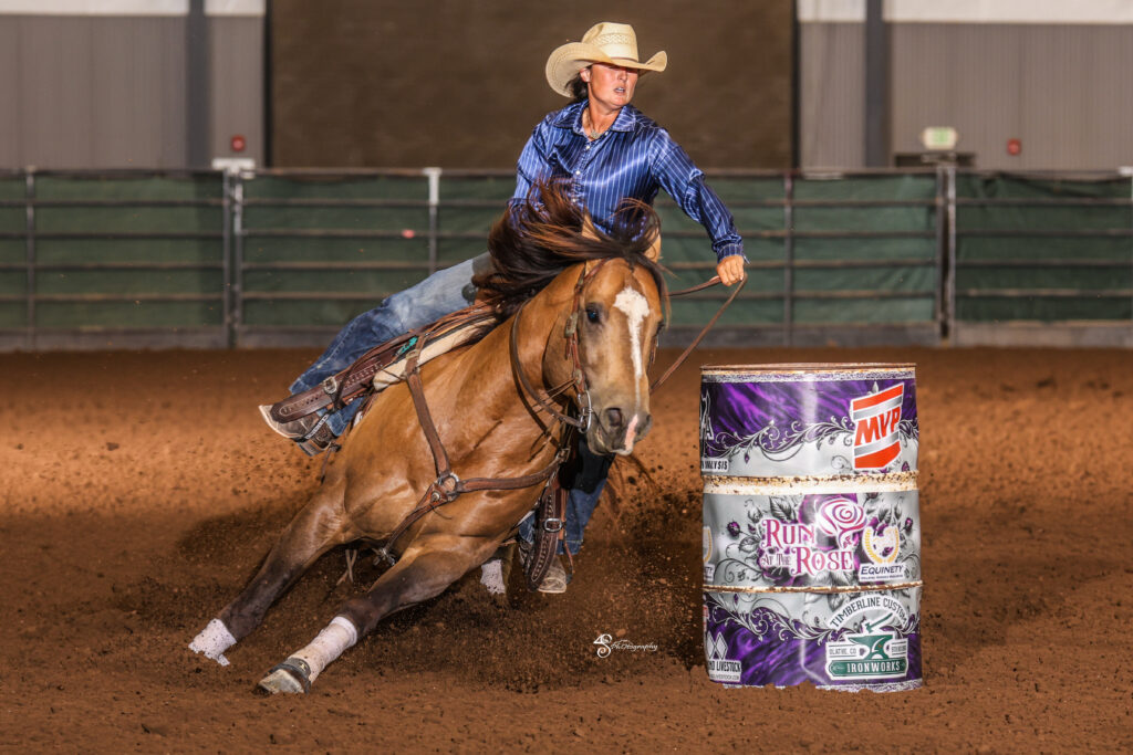 Taylor Langdon goes around a barrel