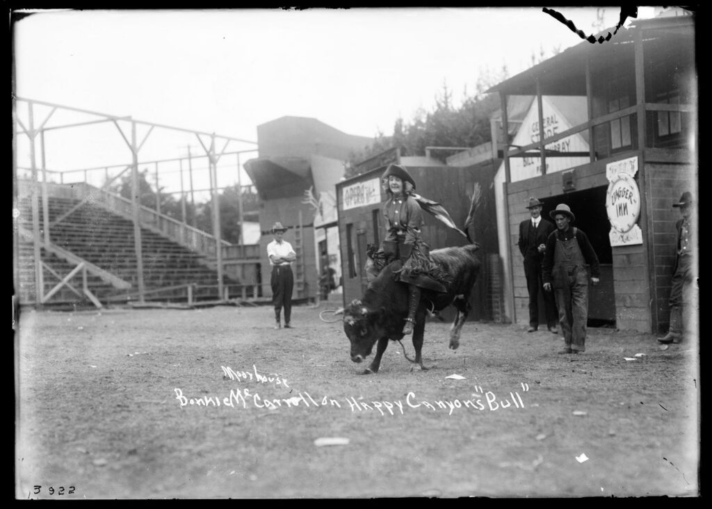 young woman Bonnie Mccarroll on a bull