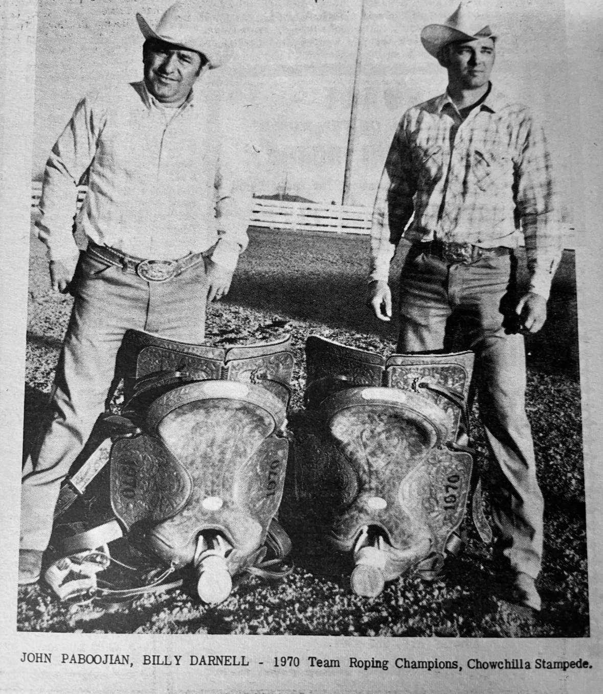 John Pabookjian and Billy Darnell with their saddles after winning the 1970 Chowchilla Stampede team roping championship