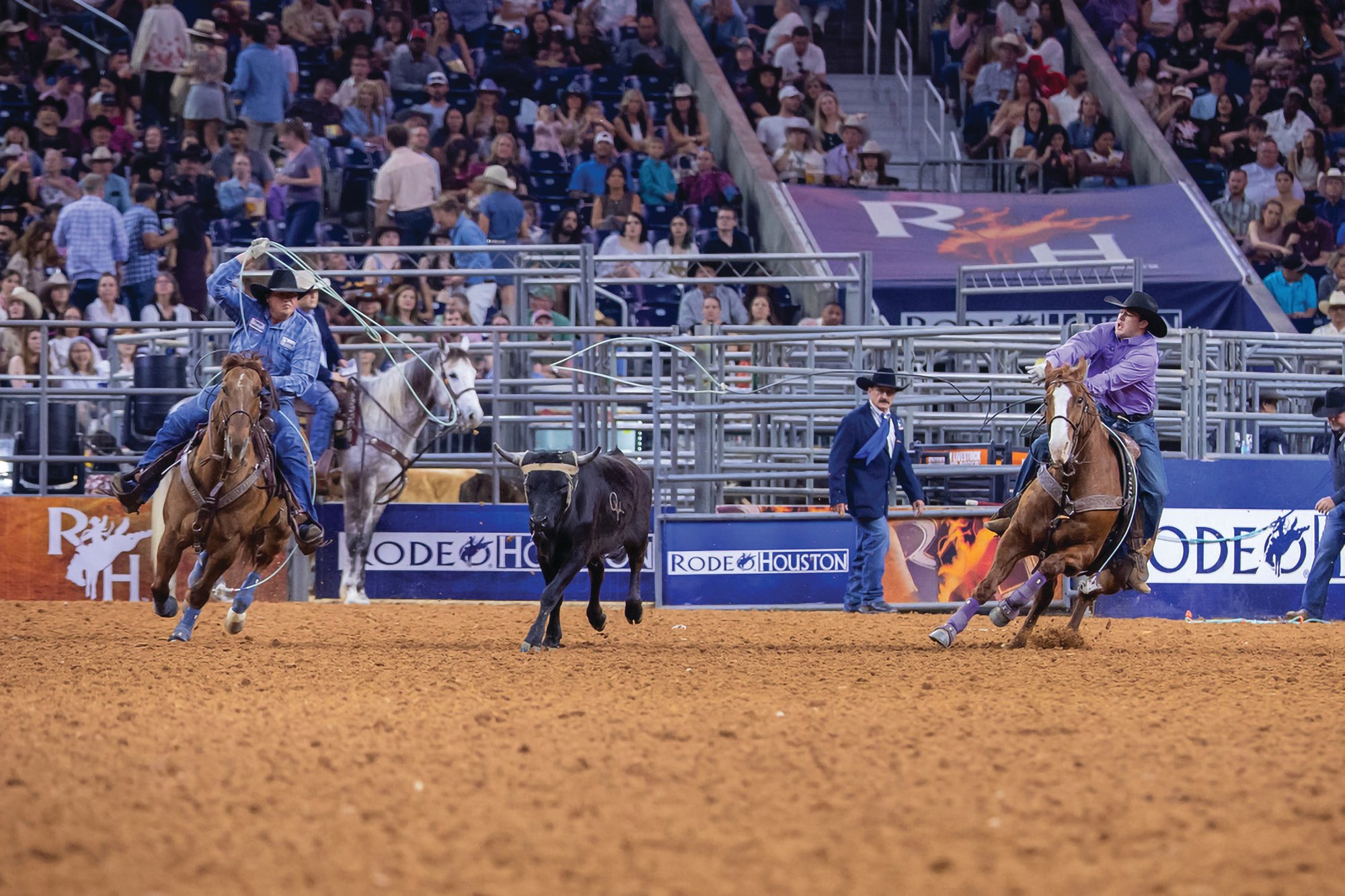 Korbin Rice and Cooper Freeman make a run together at RodeoHouston in front of a packed crowd