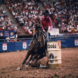 Deb Manon and Brown barrel racing