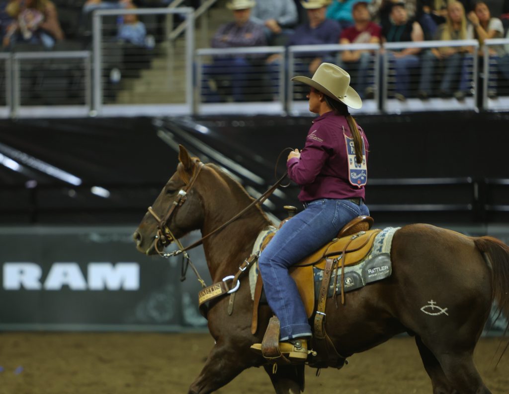 Kelsie Domer rides out of the arena at Sioux Falls