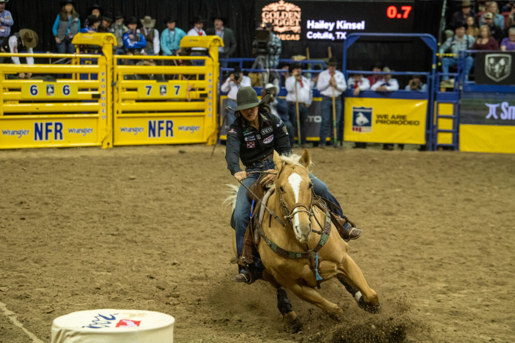 Hailey Kinsel barrel racing at the 2022 NFR.