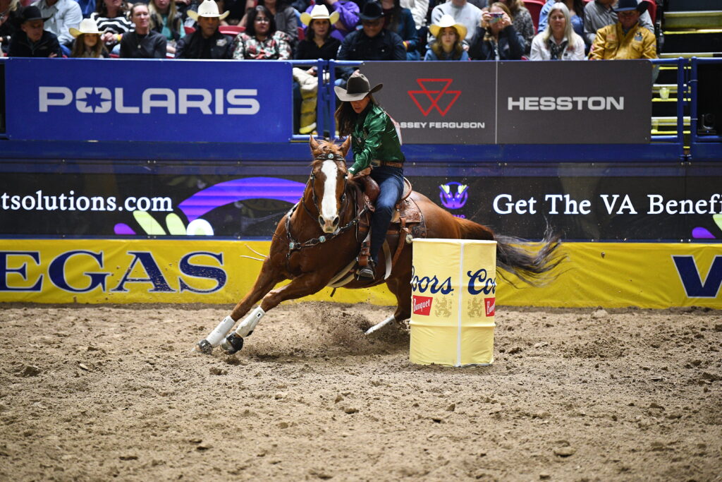 Andrea Busby NFR 2024 barrel racing on Benny