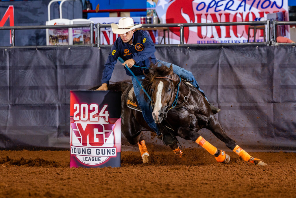 EF Eurus Ta Fame beneath Sidnei Pereira Da Silva Jr. barrel racing