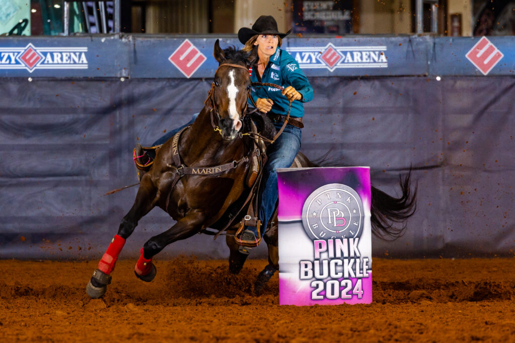 Ashley Schafer and Fiesta By Design barrel racing