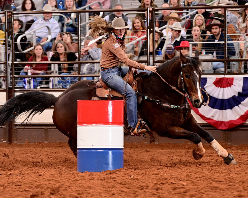 Jackie Ganter barrel racing on her horse Tycoon in Fort Worth.