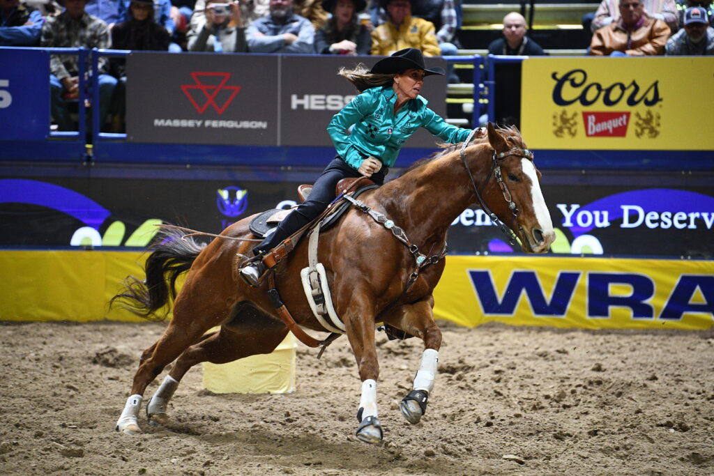 Andrea Busby and Jets Top Gun Benny NFR barrel racing