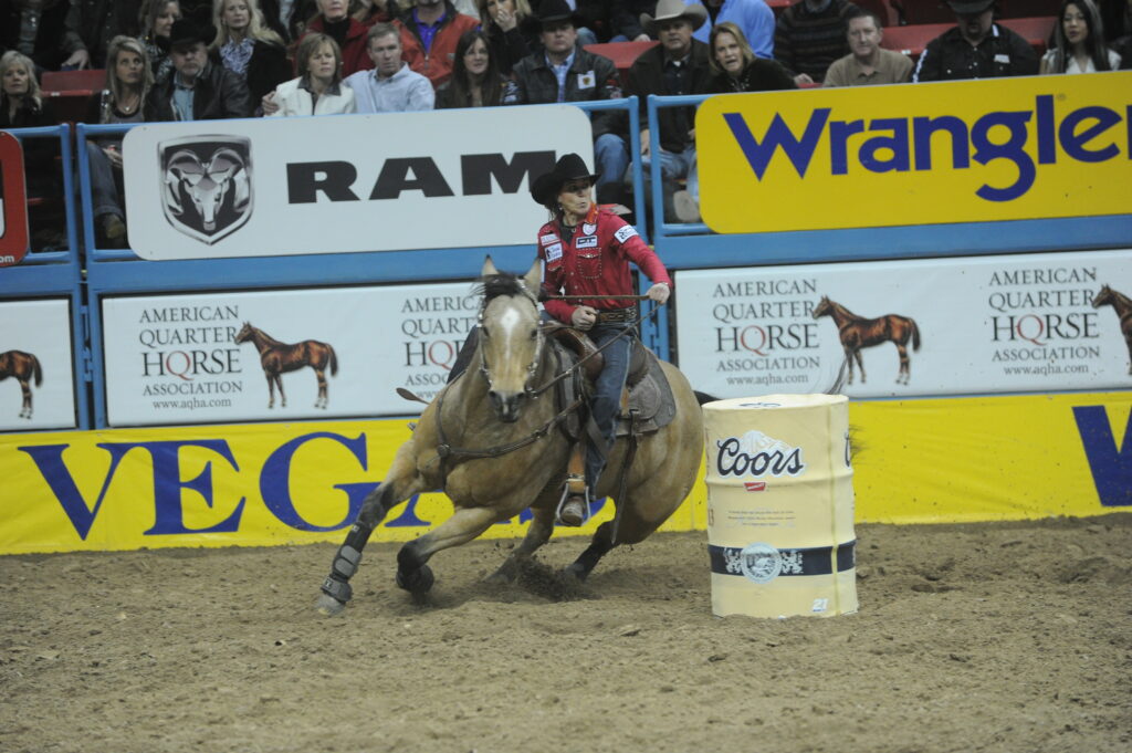 Lisa Lockhart and Louie Barrel racing
