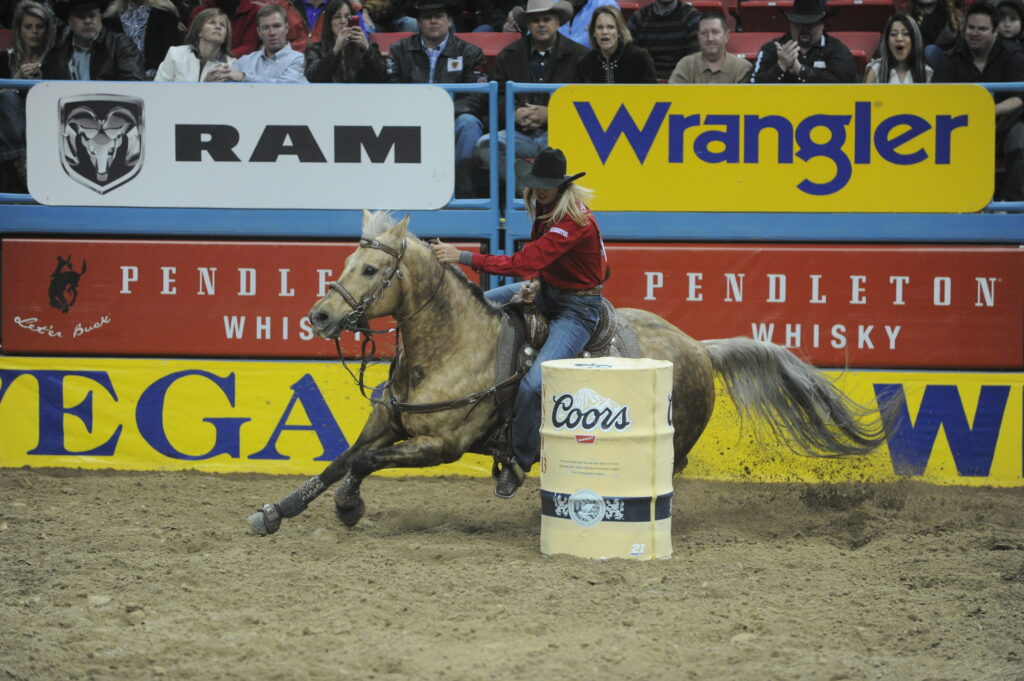 Sherry Cervi barrel racing on Stingray.